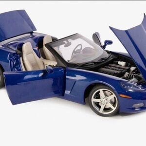 Sleek Blue Convertible Corvette Model Car Anniversary Edition